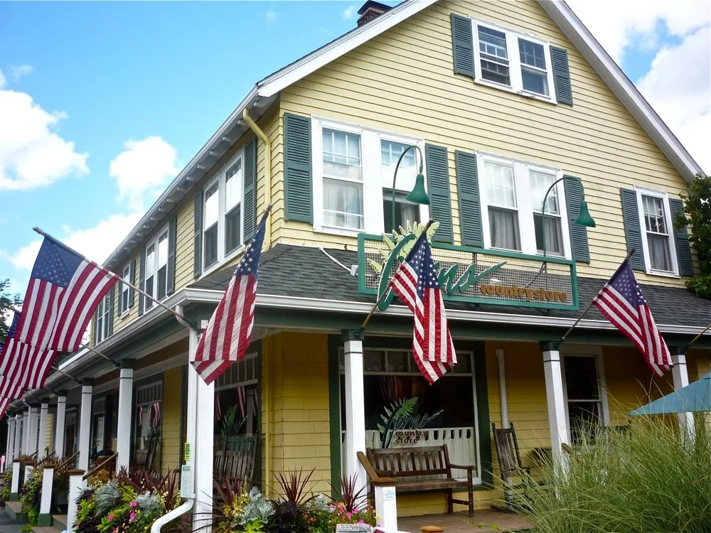 The porch and flags outside Ferns Country Store
